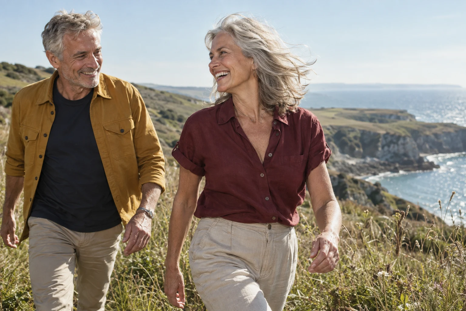 A woman enjoying a sunny coastal walk